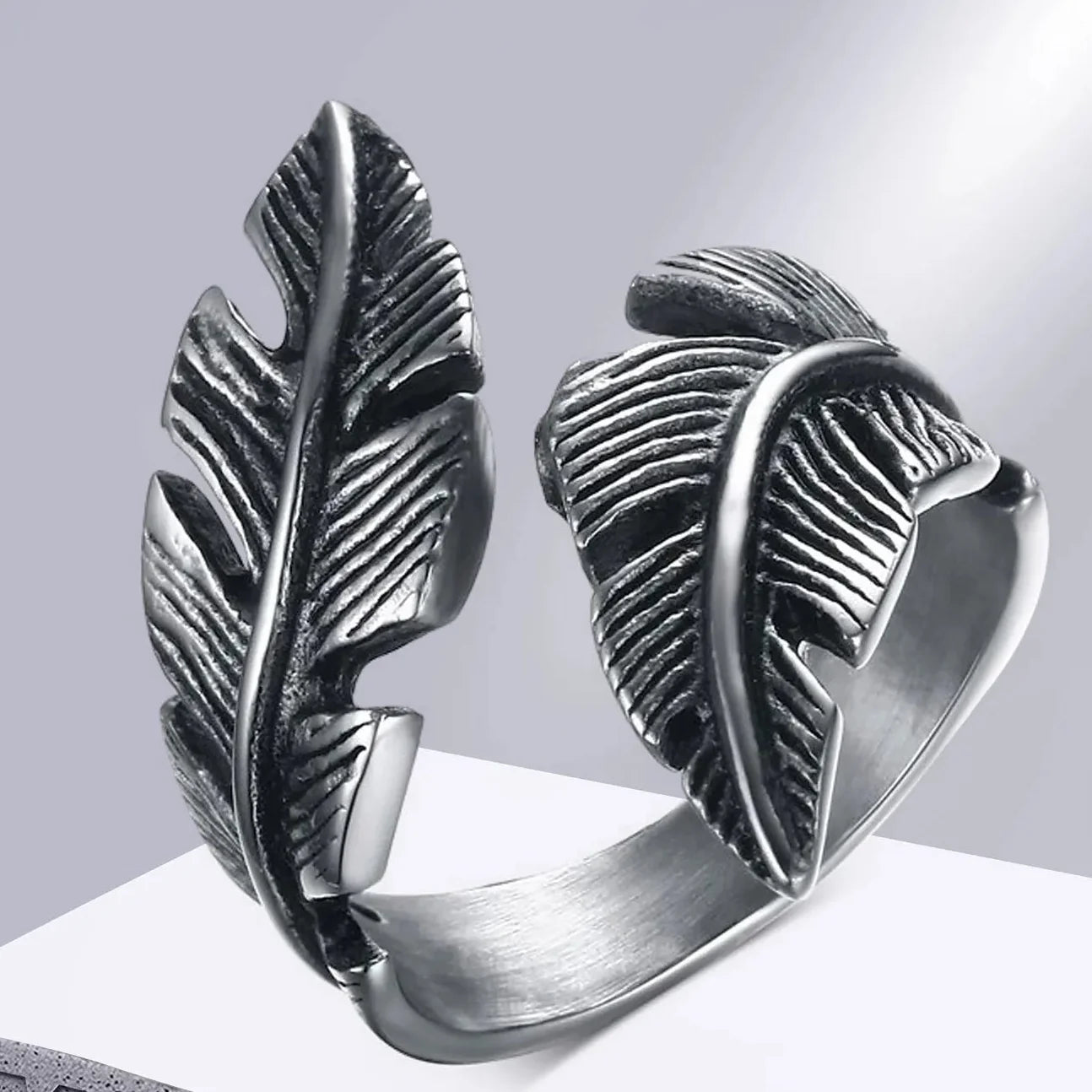 Bague ajustable plume argentée