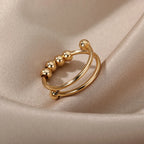 Anti-Stress Ring Band with Spinning Pearls gold