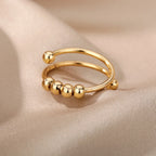 Anti-Stress Ring Band with Spinning Pearls gold