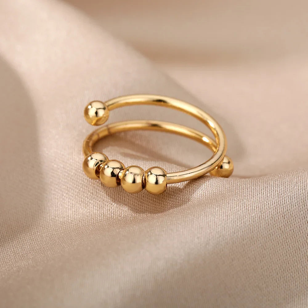 Anti-Stress Ring Band with Spinning Pearls gold