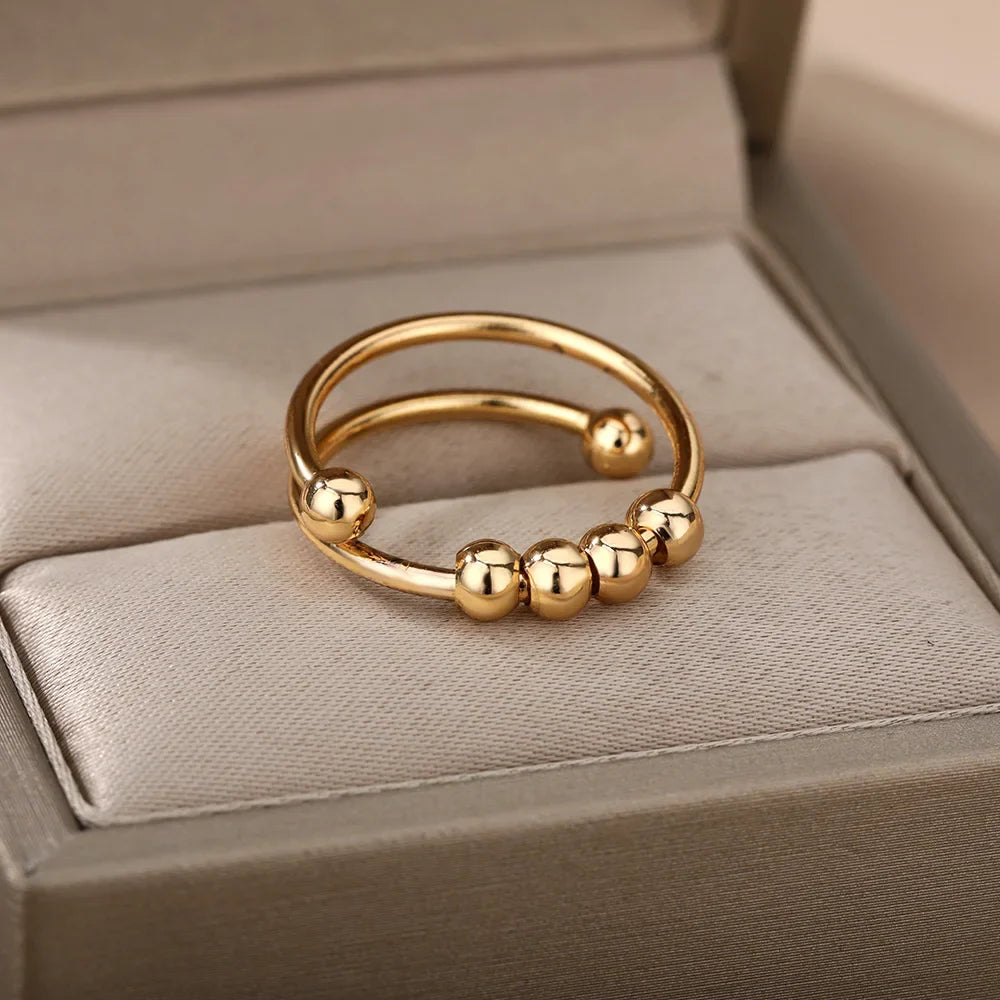 Anti-Stress Ring Band with Spinning Pearls gold