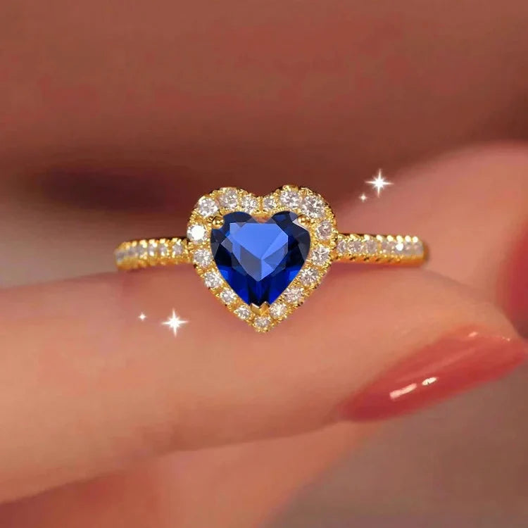 Ring with Heart and Blue Zircon and Gold