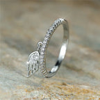 Bague avec pendentif ailes d'ange argent