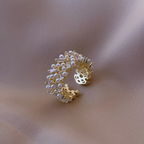 Ring with White Zircon Pearls