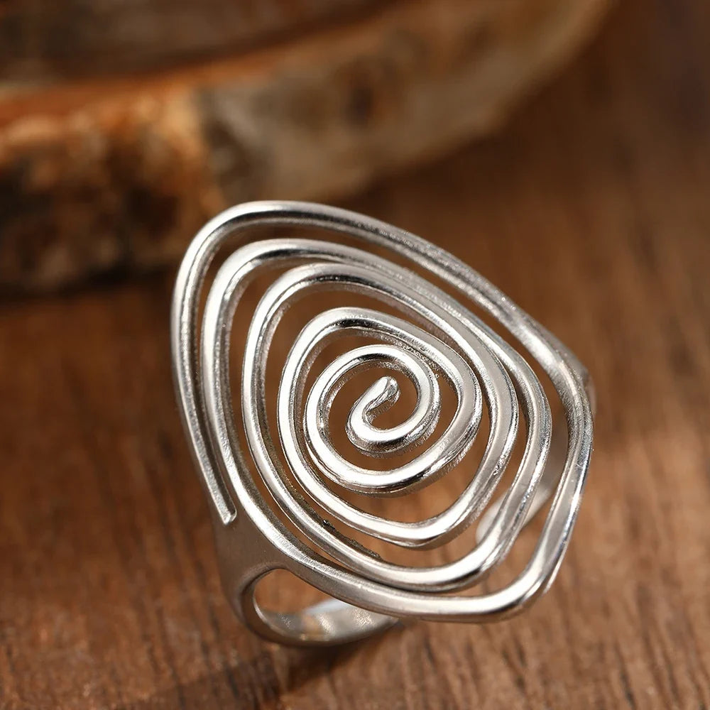 Bague large en forme de spirale texturée argent