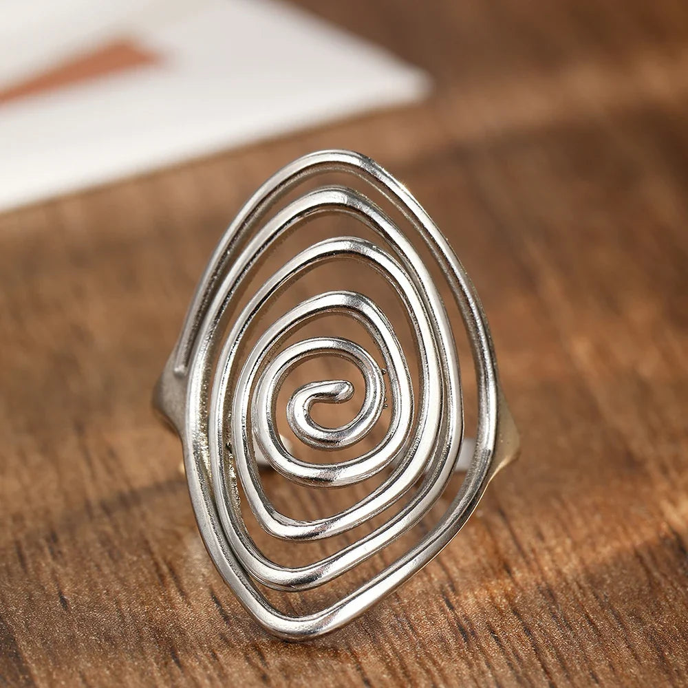 Bague large en forme de spirale texturée argent