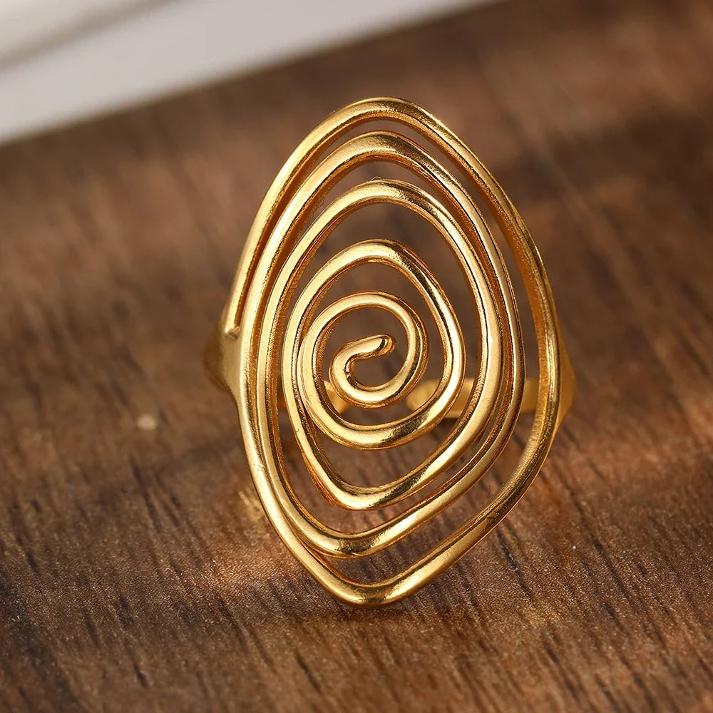 Bague large en forme de spirale texturée or