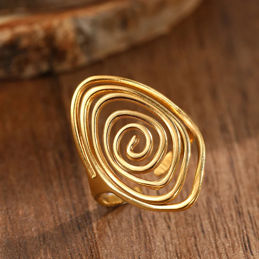 Bague large en forme de spirale texturée or