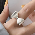 Bague noeud papillon et perles