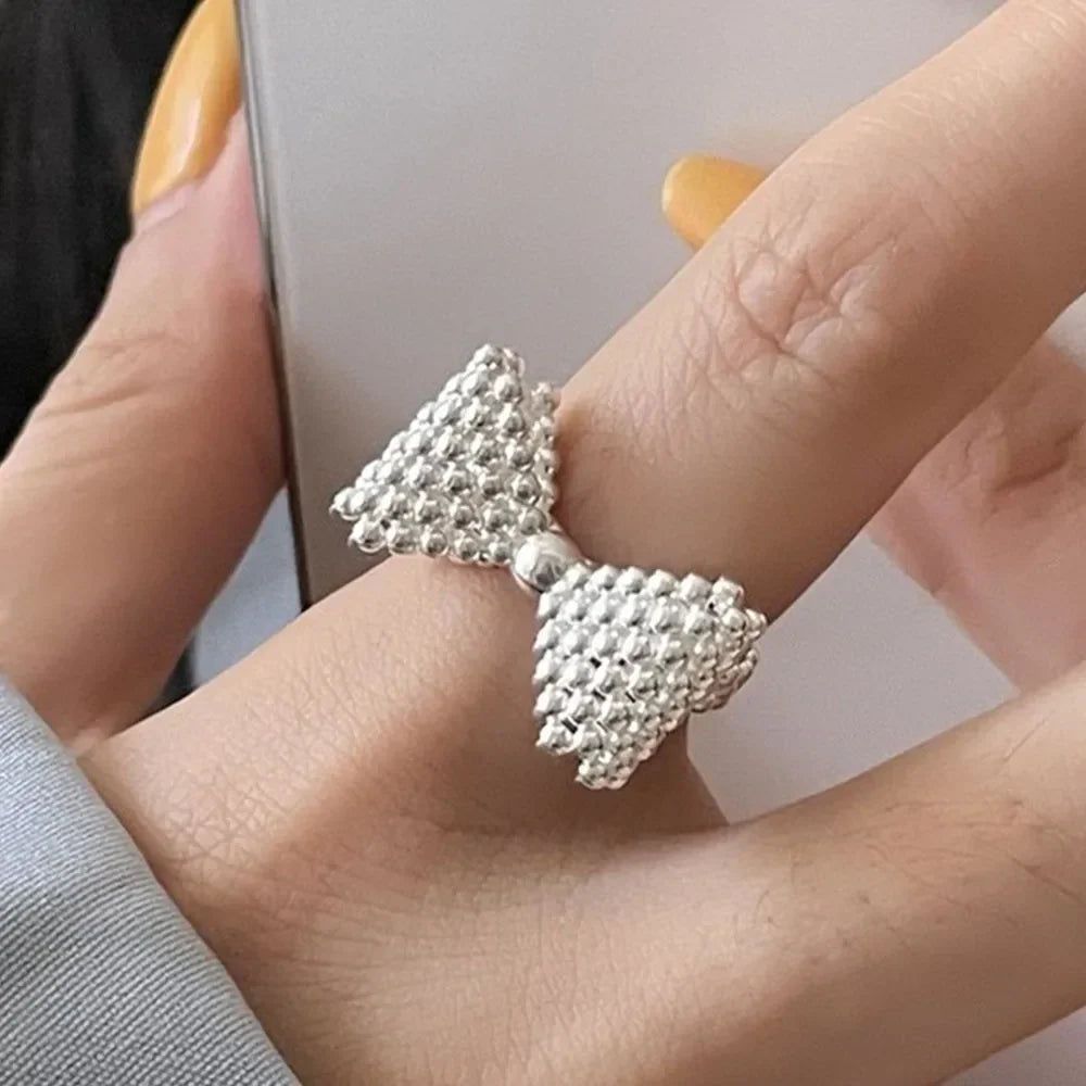 Bague noeud papillon et perles