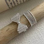 Bague noeud papillon et perles
