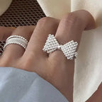 Bague noeud papillon et perles