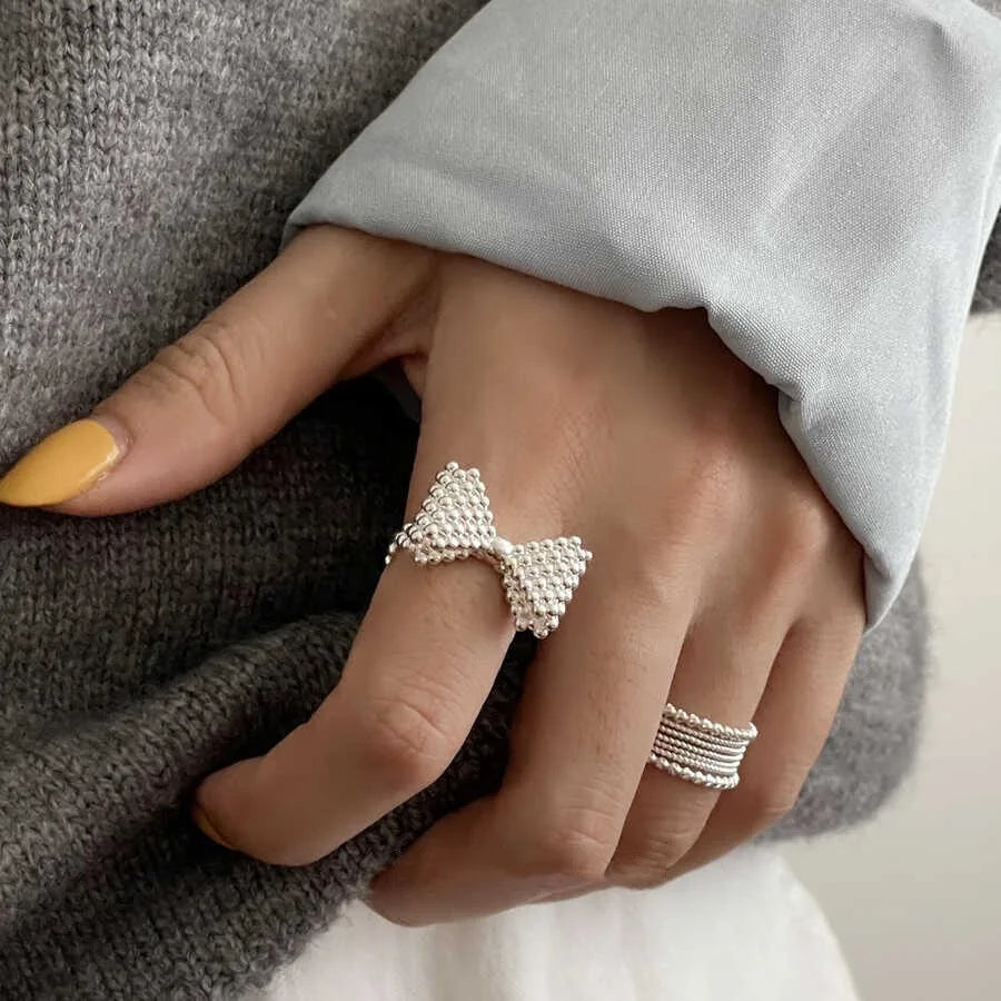 Bague noeud papillon et perles
