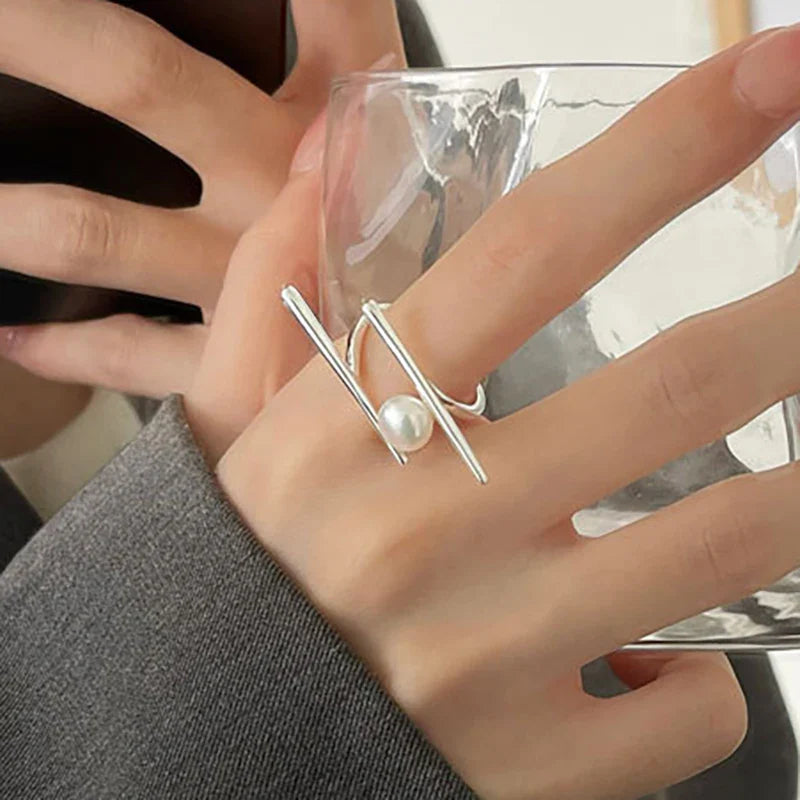 Stylish Ring with White Pearl in Zircon