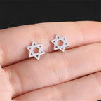 Boucles d'oreilles avec l'étoile de David symbolique juive argent