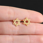 Boucles d'oreilles avec l'étoile de David symbolique juive or