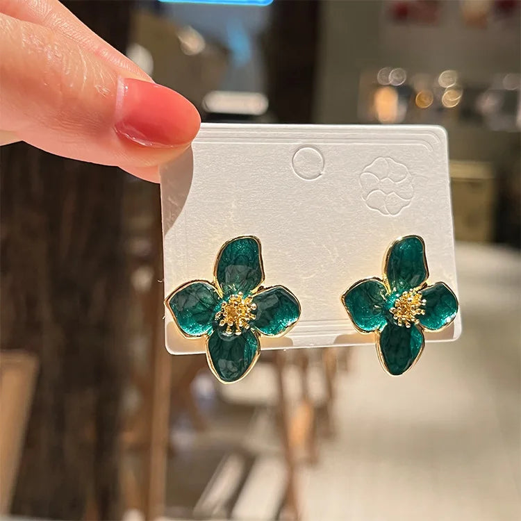 Hibiscus Flower Stud Earrings with Green Pearly Petals