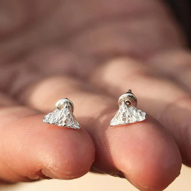 Silver Mountain Stud Earrings


Material: steel


Colors: silver


Size: 1 cm diameter (see image)


Guaranteed hypoallergenic, suitable for men, women, boys, or girls


Highly crafted product