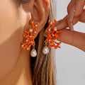 Boucles d'oreilles corail orange et perle