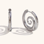 Boucles d'oreilles créoles avec motif spirale argent