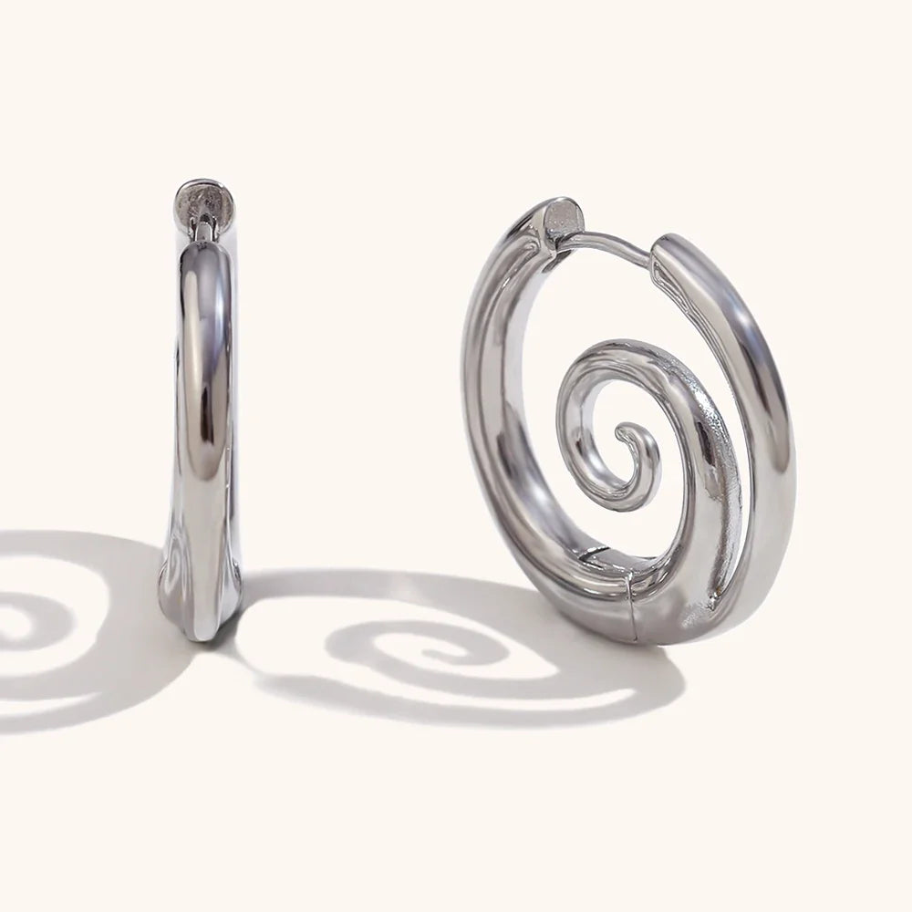 Boucles d'oreilles créoles avec motif spirale argent