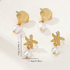 Boucles d'oreilles dorées coquillage et perle