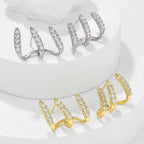 Elegant earrings with three-prong rhinestones 