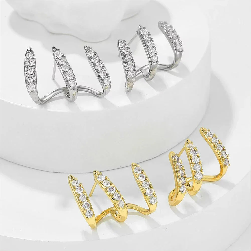 Elegant earrings with three-prong rhinestones 