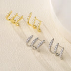 Elegant earrings with three-prong rhinestones 