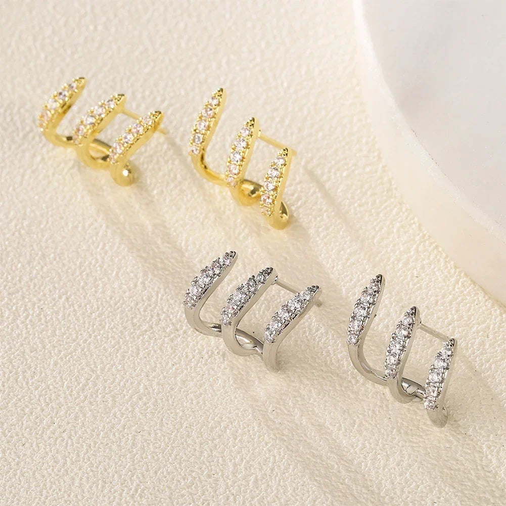 Elegant earrings with three-prong rhinestones 