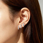 Elegant earrings with three-prong rhinestones 