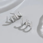 Elegant earrings with three-prong rhinestones 