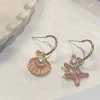 Boucles d'oreilles émaillées coquillage et perle rose