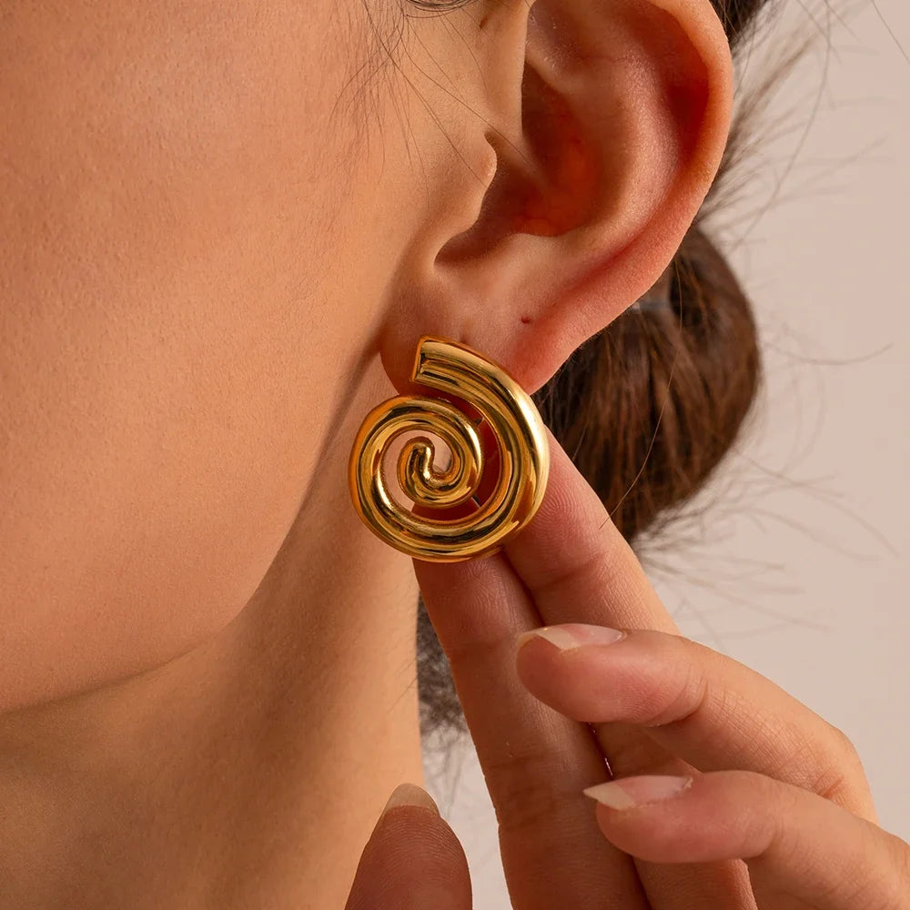 Boucles d'oreilles en forme de spirale bombée or