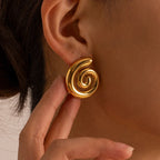 Boucles d'oreilles en forme de spirale bombée or