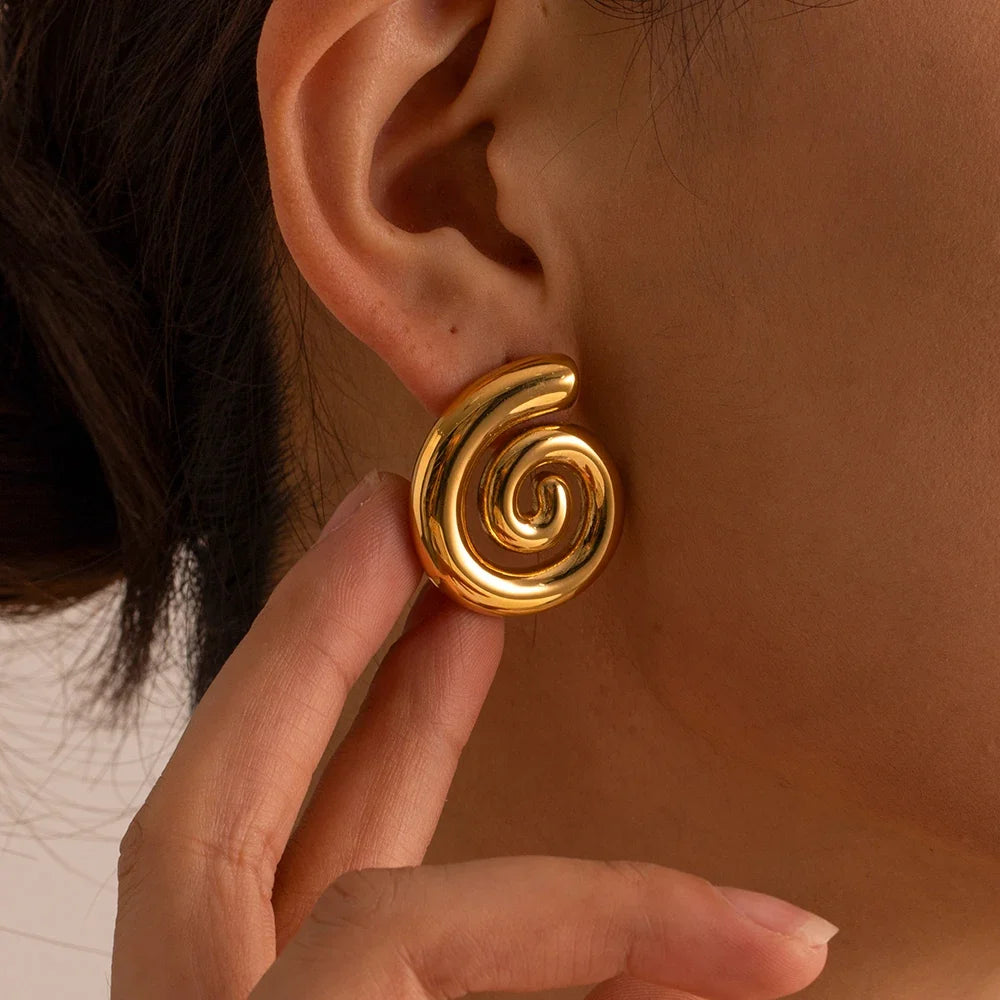 Boucles d'oreilles en forme de spirale bombée or