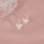 Boucles d'oreilles femme noeud papillon