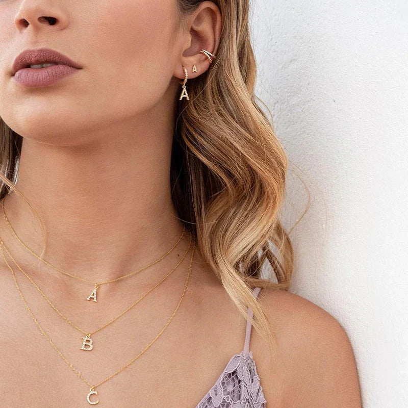 Boucles d'oreilles créoles avec initiale femme