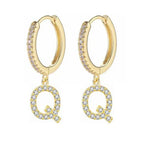 Boucles d'oreilles créoles avec initiale femme q