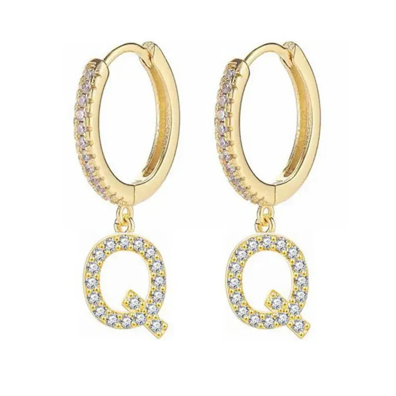 Boucles d'oreilles créoles avec initiale femme q