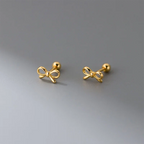 Boucles d'oreilles minimalistes noeud papillon or