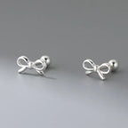 Boucles d'oreilles minimalistes noeud papillon argent