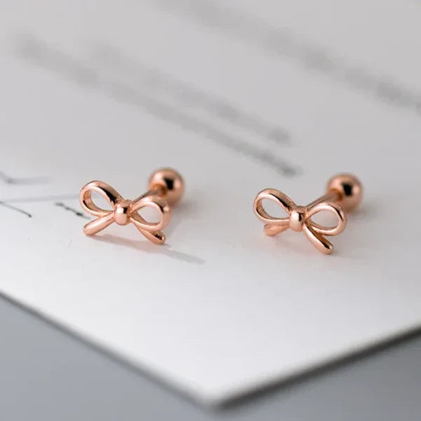 Boucles d'oreilles minimalistes noeud papillon or rose