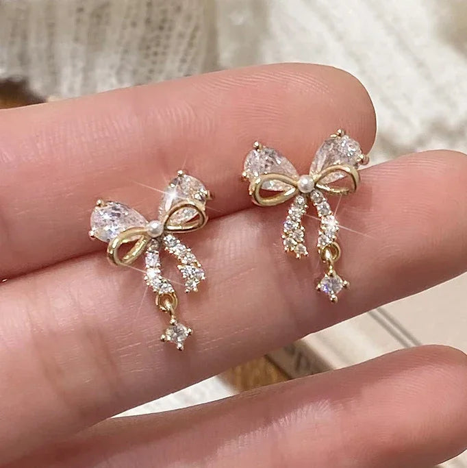 Boucles d'oreilles noeud papillon femme or