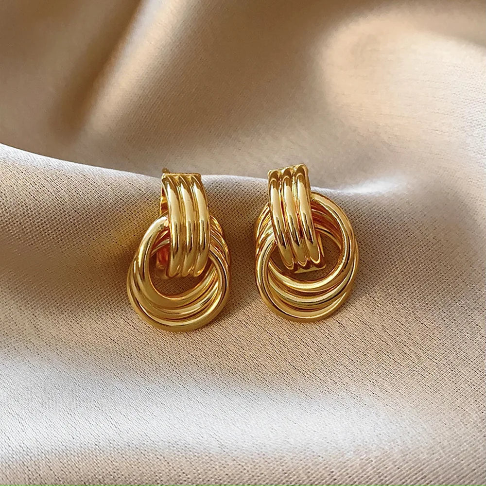 Boucles d'oreilles noeud pour femme or