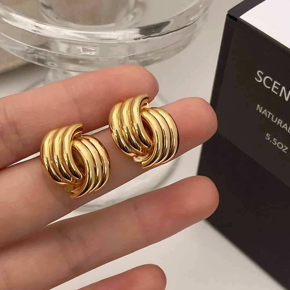 Boucles d'oreilles noeud pour femme or