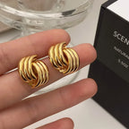 Boucles d'oreilles noeud pour femme or
