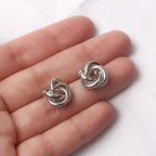 Boucles d'oreilles noeud torsadé argent