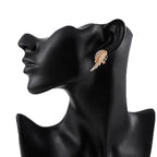 Boucles d'oreilles pendantes ailes d'ange avec strass