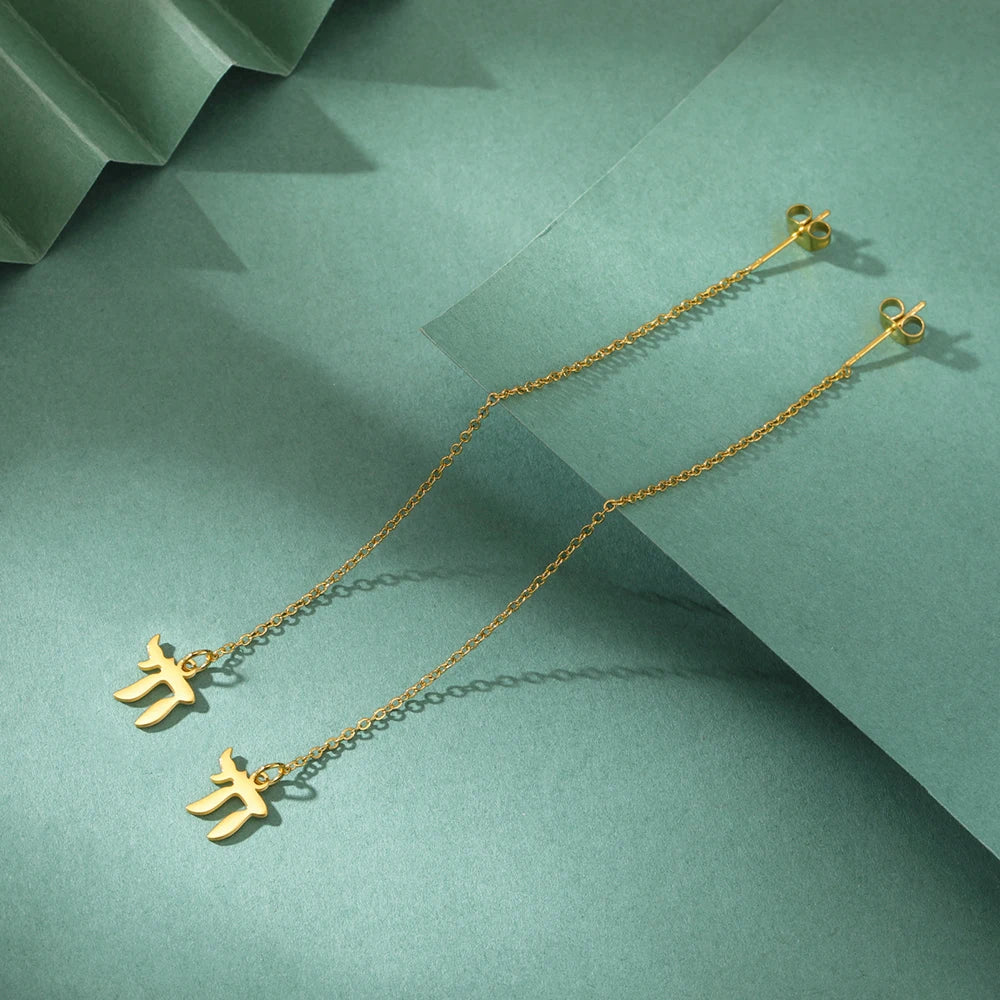 Boucles d'oreilles pendantes avec le symbole de vie juive Chai or